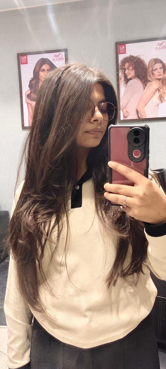 Riya after a haircut, starting fresh