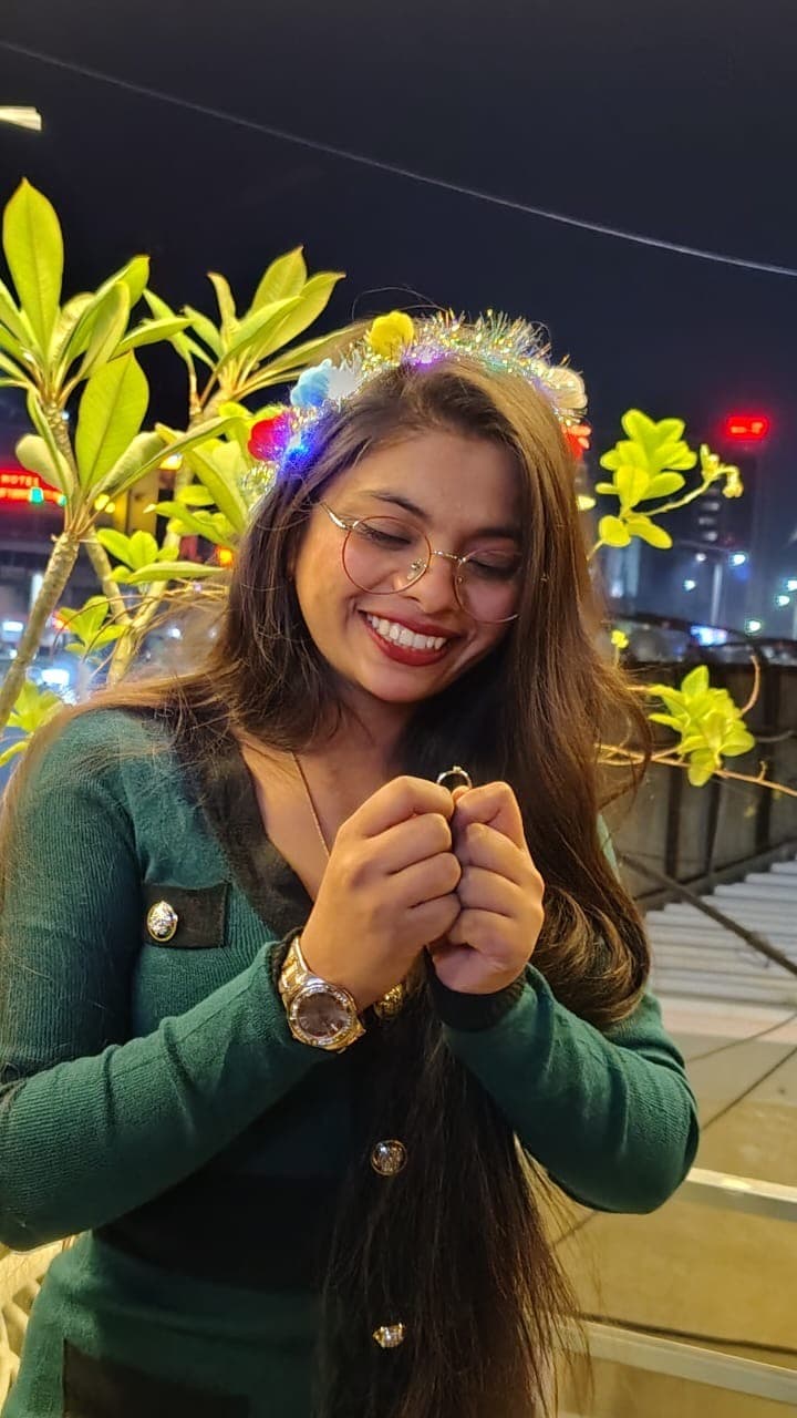 Riya today, smiling