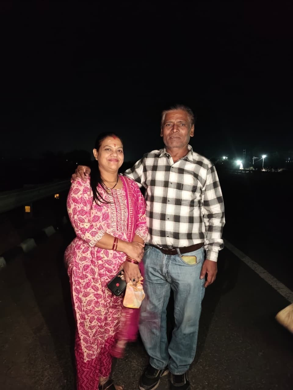 Riya's parents, together